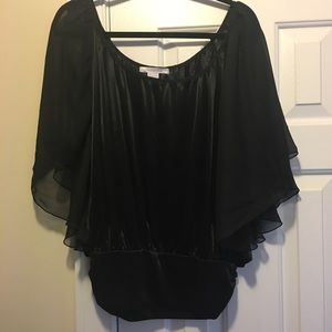 NWOT. Black sassy blouse.